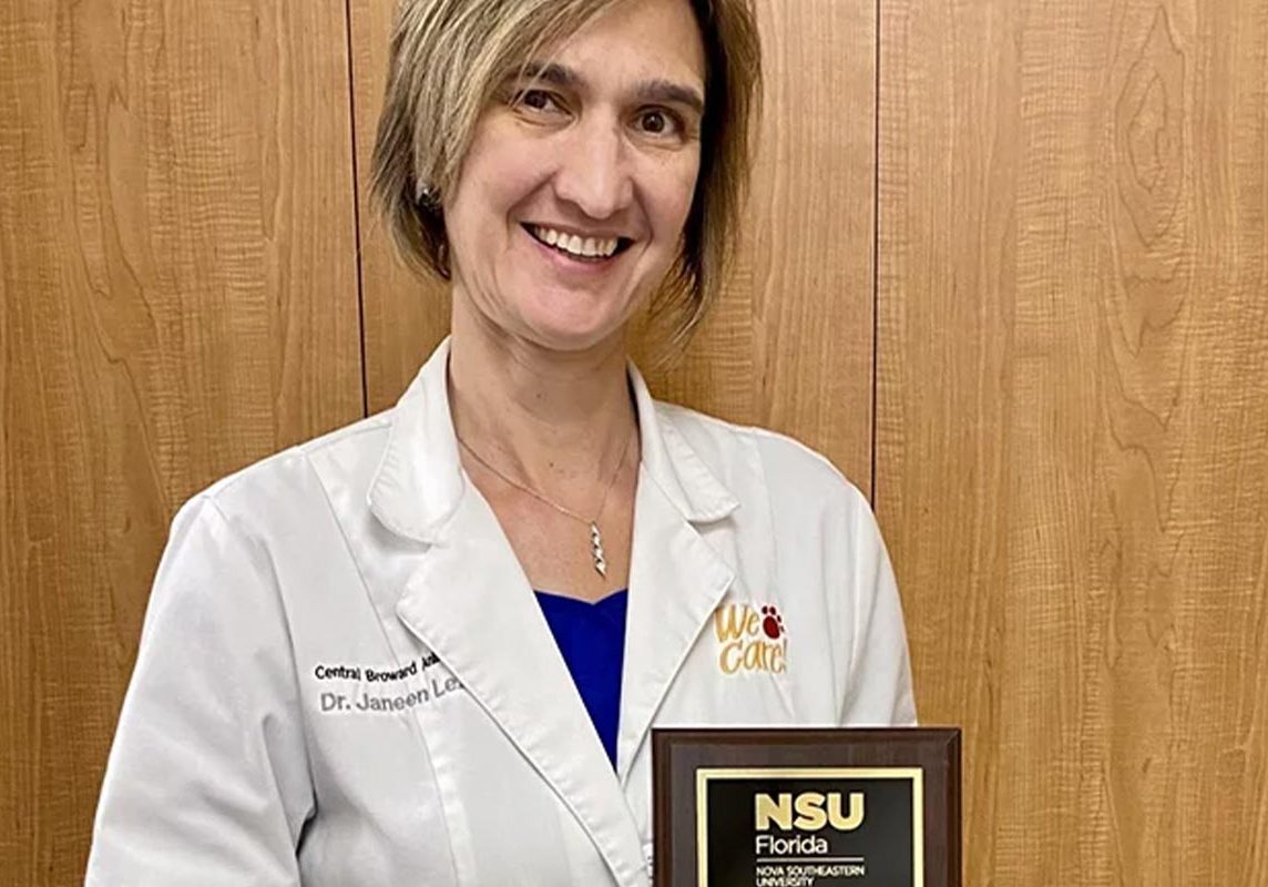 Doctor Holding Nova Award Mobile